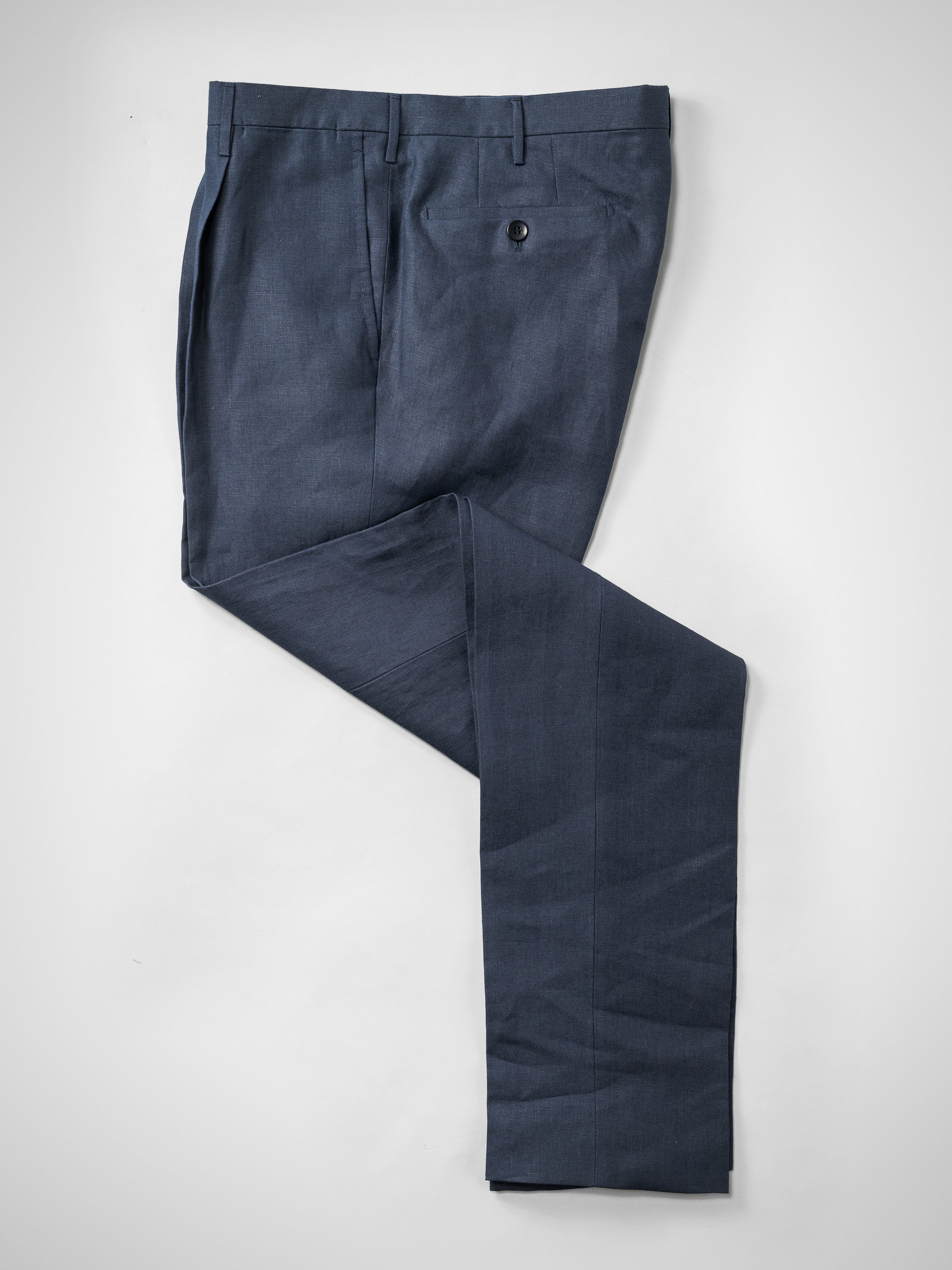 Dark blue pair of regular fit linen trousers